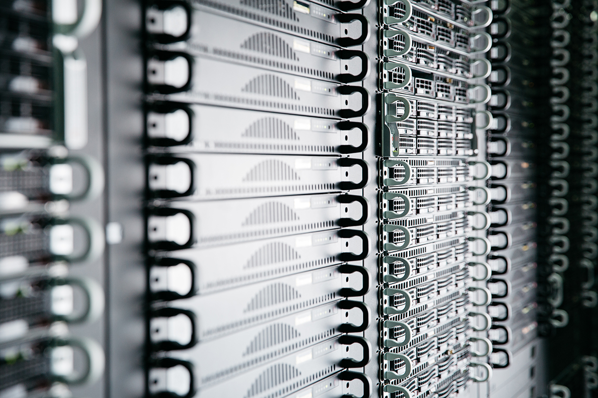 An image showing stacks of dedicated servers placed in a rack